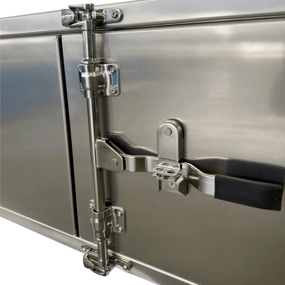 Close-up of stainless steel latch and reinforced hinges on the 201004 aluminum truck tool box