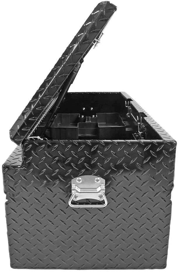 Side view inside the 201008 diamond plate truck box showing lid support and deep storage space