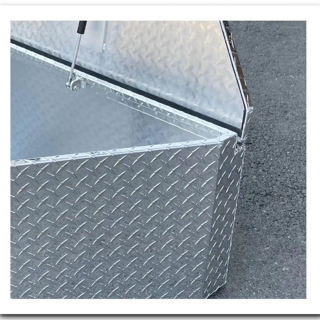 Welded hinge and reinforced corner detail on the 201011 checker plate trailer tongue box