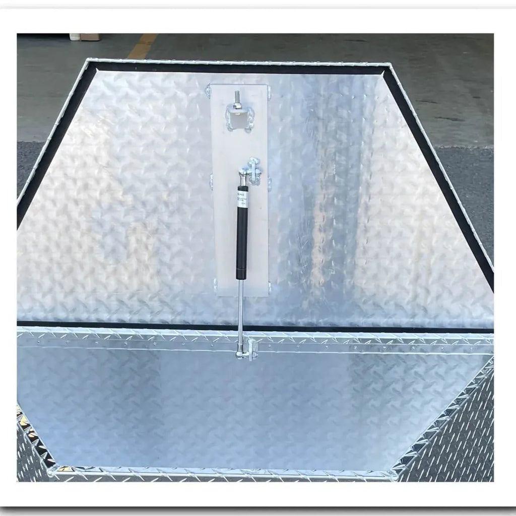 Front detail of aluminum trailer tongue tool box with locking lid and black rubber weather seal