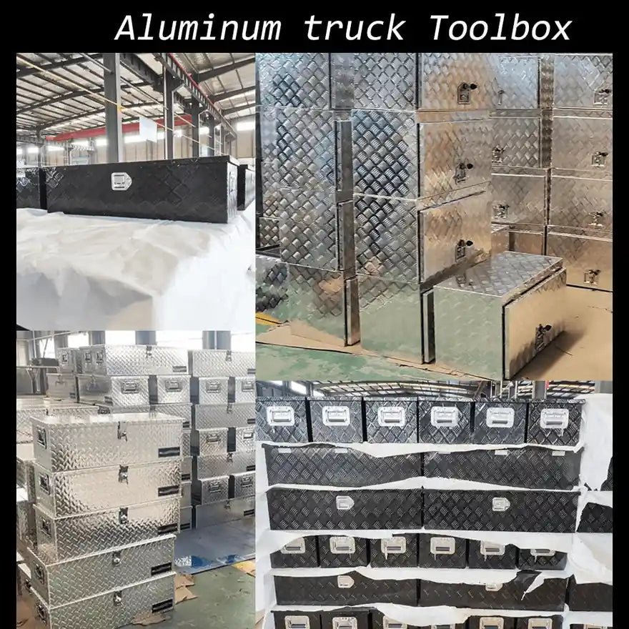 Factory display of silver and black checker plate aluminum truck storage boxes