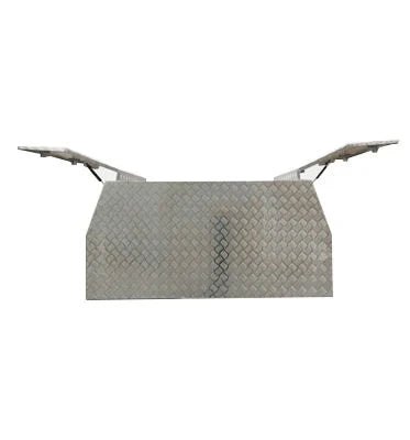 Rear view of wide aluminum canopy tool box with dual gullwing access doors raised