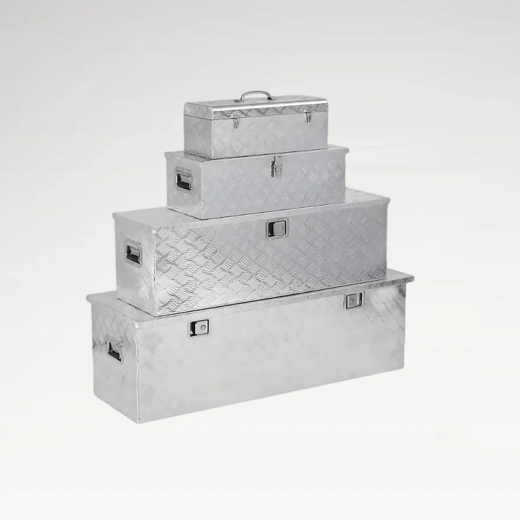 Four sizes of LANSHUO 201090-2 checker plate aluminum truck tool boxes stacked for comparison