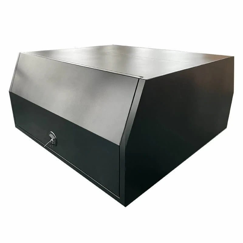 Closed black aluminum ute canopy box with sloped front profile and lockable lower door