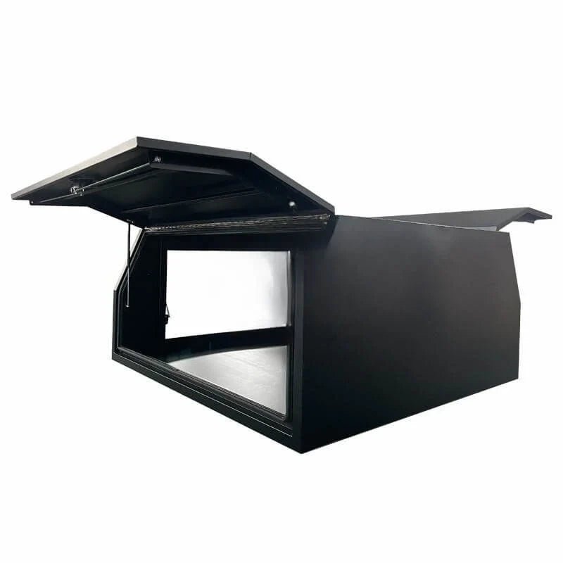 Open black ute canopy box showing large framed side compartment and gas-strut supported lid