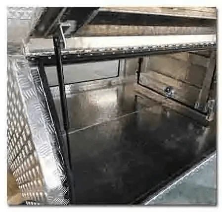 Welded aluminum interior and gas strut detail inside the 201111 truck canopy tool box