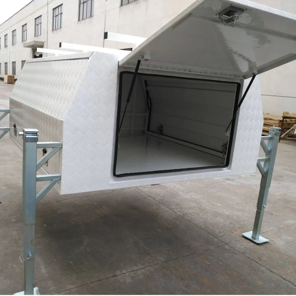 Open side compartment of the three-door aluminum caravan canopy storage box