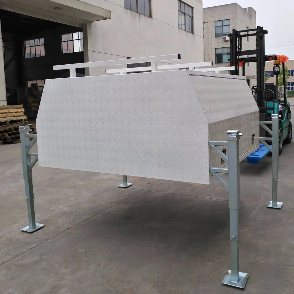 Rear view of closed 201112 aluminum checker plate canopy box mounted on a steel support frame