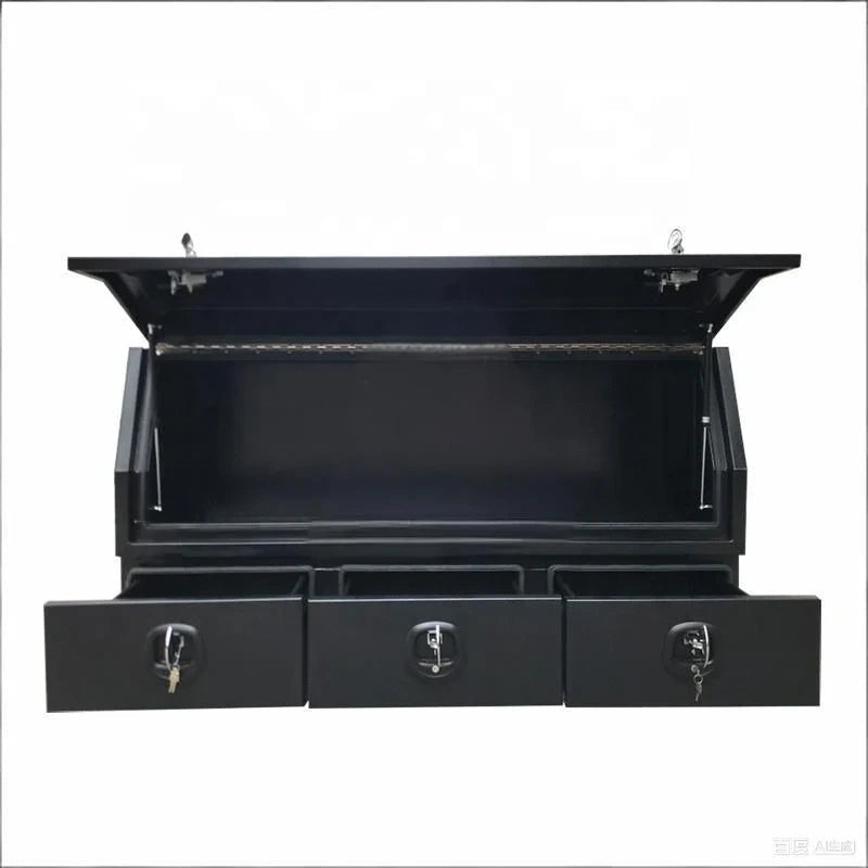 Front view of open black canopy storage box with lockable lid and three sliding drawers