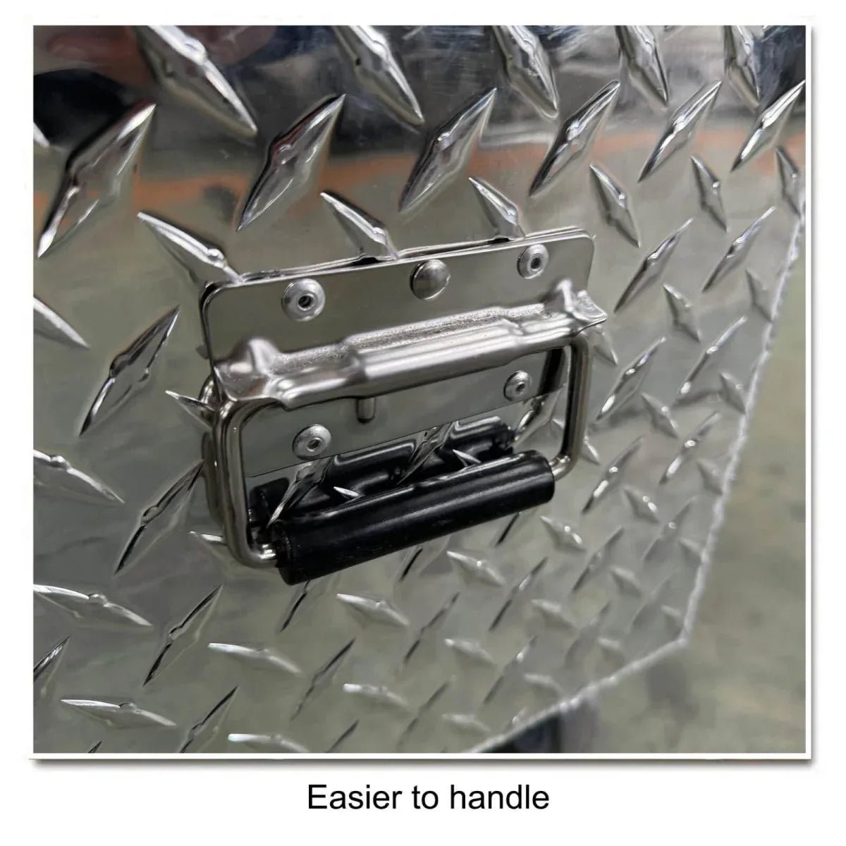 Fold-down side carrying handle detail on the 201130 diamond plate mobile tool box