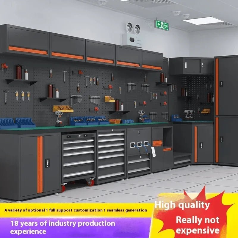 Installed HYD-03 garage storage system with workbench, pegboard tools, overhead cabinets and tall lockers