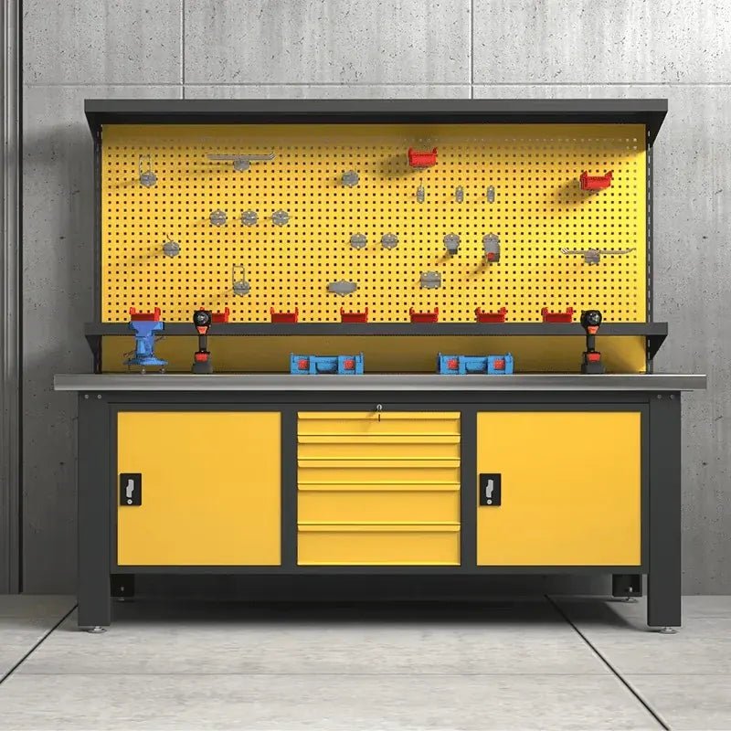 Front view of yellow LANSHUO PBD-29 industrial workbench with pegboard tool storage and cabinets